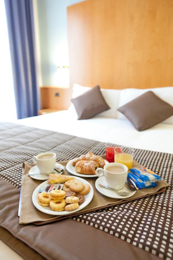 Una Hotels Оккьобелло Экстерьер фото