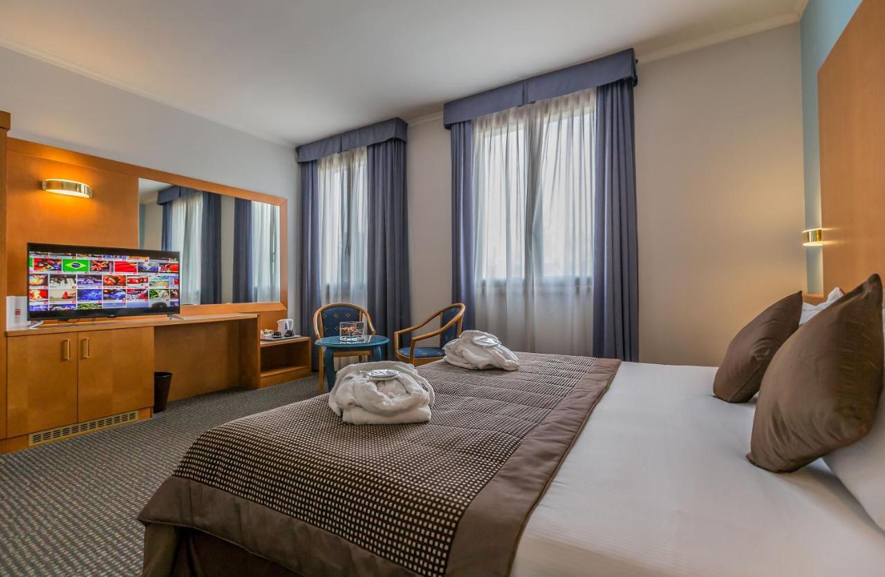 Una Hotels Оккьобелло Экстерьер фото